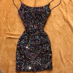 Mini sparkly backless dress